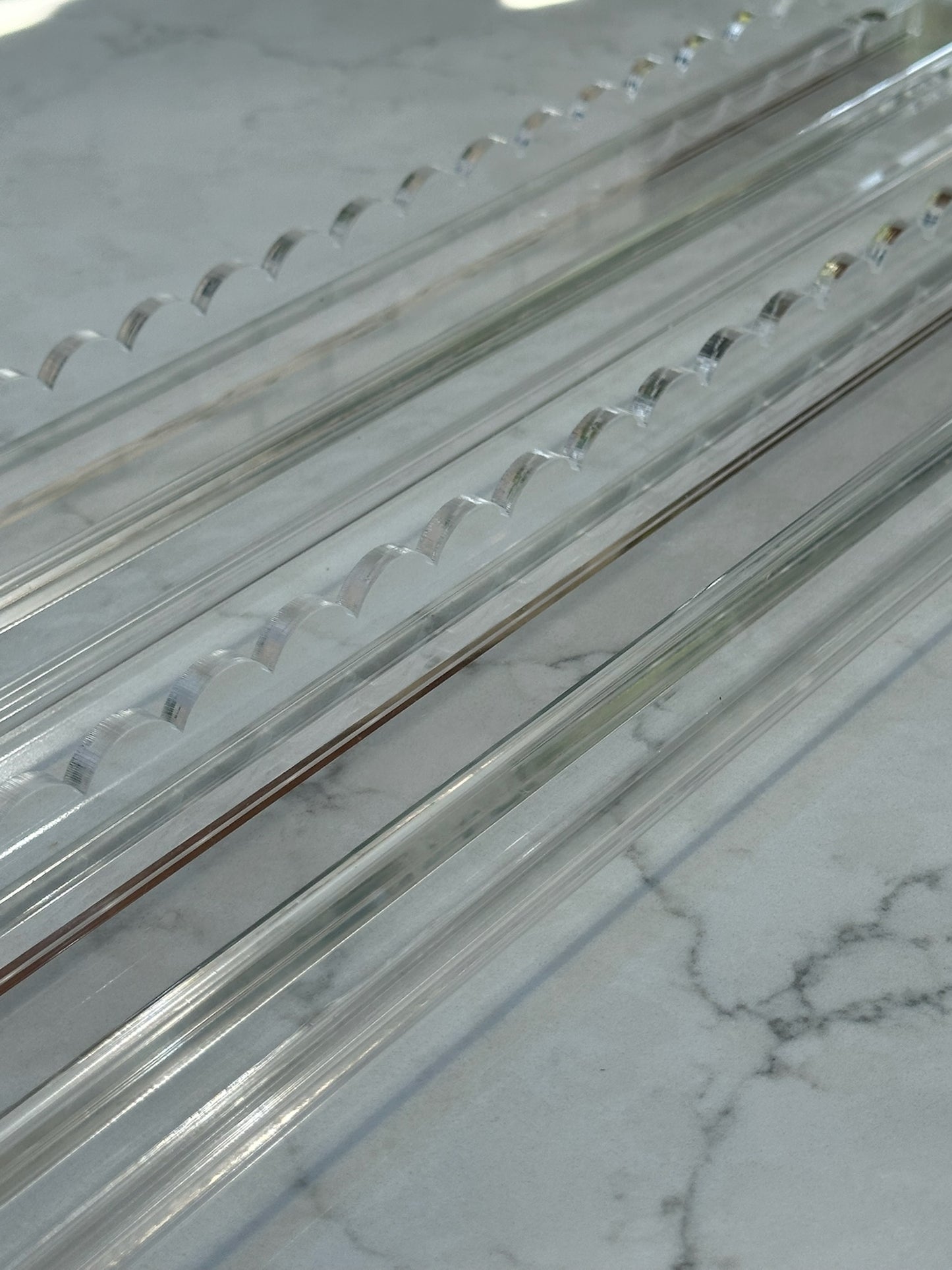 SCALLOPED LUCITE RACKS AND PUSHERS